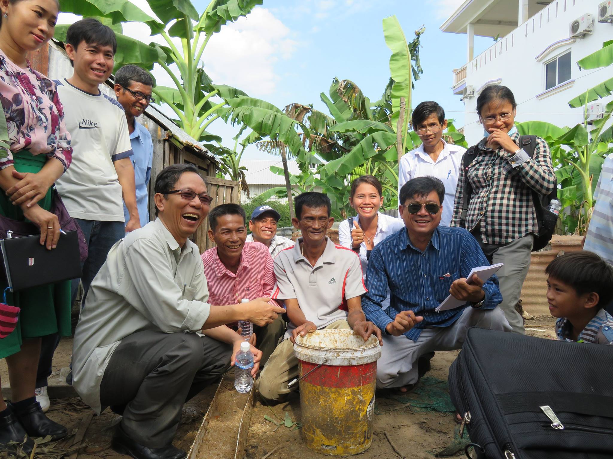 AUA staff learn about Salvation Centre Cambodia's income-generating projects on an exchange visit to Siem Reap in 2015.